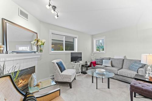 105-160 5 Avenue, Salmon Arm, BC - Indoor Photo Showing Living Room With Fireplace