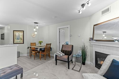 105-160 5 Avenue, Salmon Arm, BC - Indoor Photo Showing Living Room With Fireplace