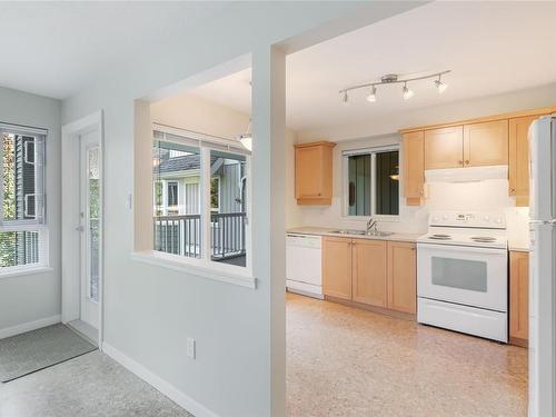 304-5660 Edgewater Lane, Nanaimo, BC - Indoor Photo Showing Kitchen With Double Sink