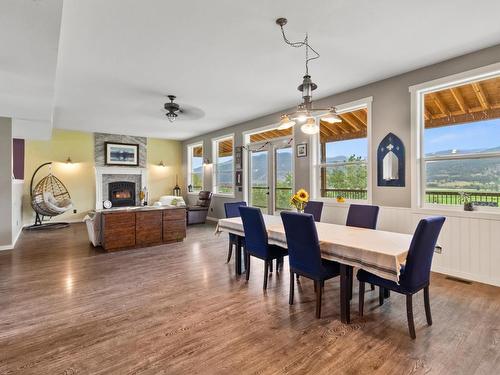 8075 Westsyde Rd, Kamloops, BC - Indoor Photo Showing Other Room With Fireplace