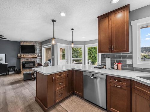 3568 Navatanee Drive, Kamloops, BC - Indoor Photo Showing Kitchen With Fireplace