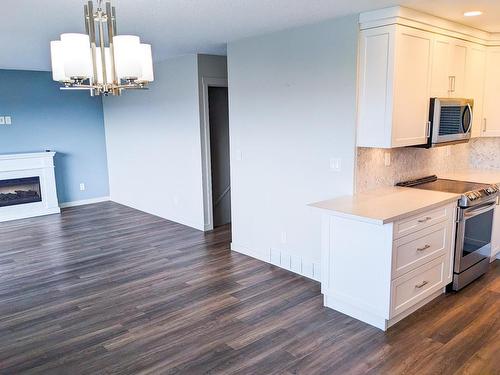 226 Monashee Place, Kamloops, BC - Indoor Photo Showing Kitchen With Fireplace