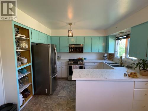 5524 53 Street, Fort Nelson, BC - Indoor Photo Showing Kitchen With Stainless Steel Kitchen With Double Sink