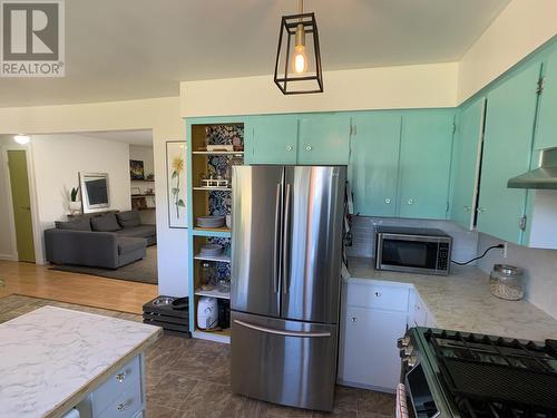 5524 53 Street, Fort Nelson, BC - Indoor Photo Showing Kitchen With Stainless Steel Kitchen