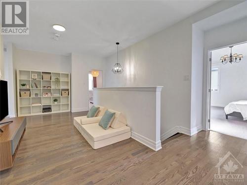 Hardwood in the hallway upstairs. Loft, perfect for catching a movie or playing Mario Kart with the kids! - 179 Lamprey Street, Ottawa, ON - Indoor