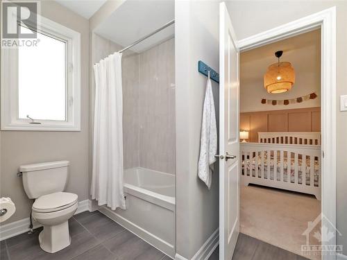 Jack-and-Jill bathroom with double sinks. - 179 Lamprey Street, Ottawa, ON - Indoor Photo Showing Bathroom