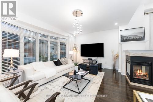 27 Agincourt Circle, Brampton (Credit Valley), ON - Indoor Photo Showing Living Room With Fireplace