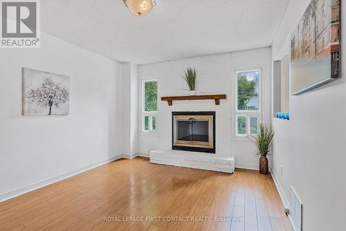 9 Carr Drive N, Barrie, ON - Indoor Photo Showing Living Room With Fireplace