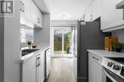 64 - 38 Corey Circle, Halton Hills (Georgetown), ON - Indoor Photo Showing Kitchen With Double Sink