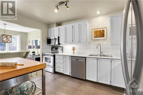 Bright and open kitchen - 25 Chisholm Court, Ottawa, ON - Indoor Photo Showing Kitchen With Double Sink