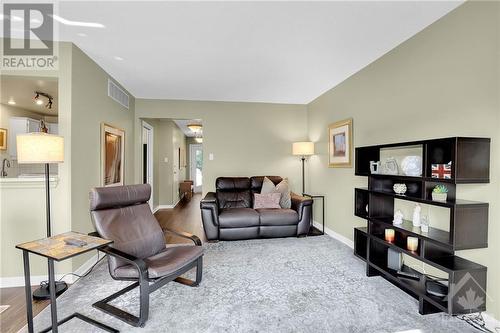 Sun-filled living room - 25 Chisholm Court, Ottawa, ON - Indoor Photo Showing Living Room