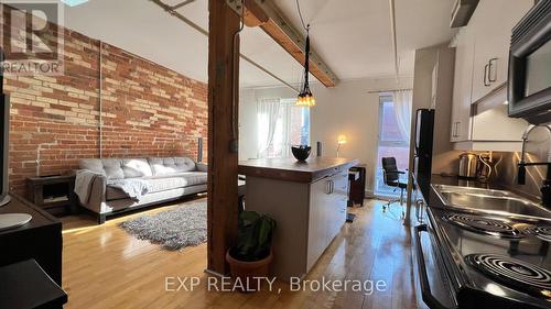 415 - 81A Front Street E, Toronto, ON - Indoor Photo Showing Kitchen With Double Sink