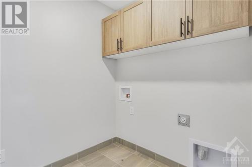 Laundry room - 136 Beebalm Crescent, Ottawa, ON - Indoor Photo Showing Other Room