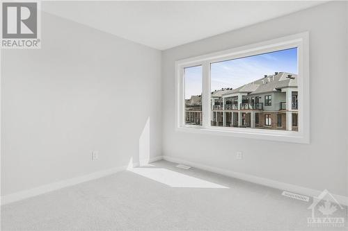 Bedroom 2 - 136 Beebalm Crescent, Ottawa, ON - Indoor Photo Showing Other Room