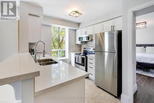 220 - 1733 Queen Street E, Toronto (The Beaches), ON - Indoor Photo Showing Kitchen With Double Sink