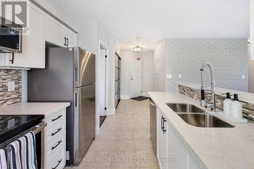 220 - 1733 Queen Street E, Toronto (The Beaches), ON - Indoor Photo Showing Kitchen With Double Sink