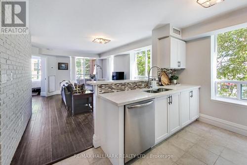 220 - 1733 Queen Street E, Toronto (The Beaches), ON - Indoor Photo Showing Kitchen With Double Sink