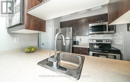 1910 - 215 Queen Street E, Brampton, ON - Indoor Photo Showing Kitchen With Stainless Steel Kitchen