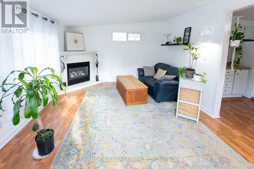 99 Linden Lane, Innisfil, ON - Indoor Photo Showing Living Room With Fireplace