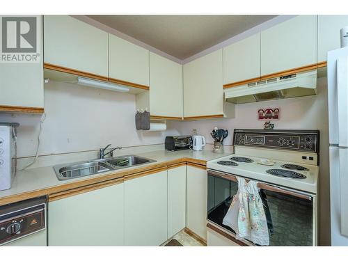 84 Van Horne Street Unit# 204, Penticton, BC - Indoor Photo Showing Kitchen With Double Sink