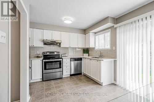 100 - 601 Shoreline Drive, Mississauga, ON - Indoor Photo Showing Kitchen With Stainless Steel Kitchen With Upgraded Kitchen