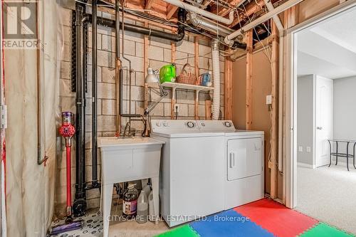 100 - 601 Shoreline Drive, Mississauga, ON - Indoor Photo Showing Laundry Room