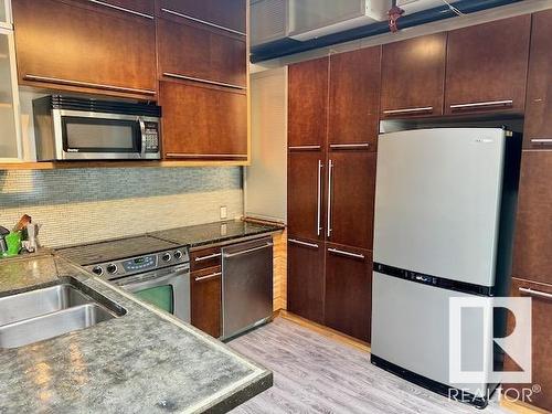 #409 10301 109 St Nw, Edmonton, AB - Indoor Photo Showing Kitchen With Double Sink