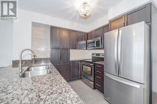 415 - 800 Lawrence Avenue W, Toronto (Yorkdale-Glen Park), ON - Indoor Photo Showing Kitchen With Double Sink