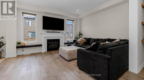 17 Herrick Drive N, Brampton, ON - Indoor Photo Showing Living Room With Fireplace