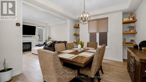 17 Herrick Drive N, Brampton, ON - Indoor Photo Showing Dining Room With Fireplace