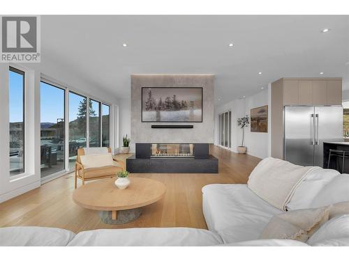 1190 Stoneypointe Court, Kelowna, BC - Indoor Photo Showing Living Room With Fireplace