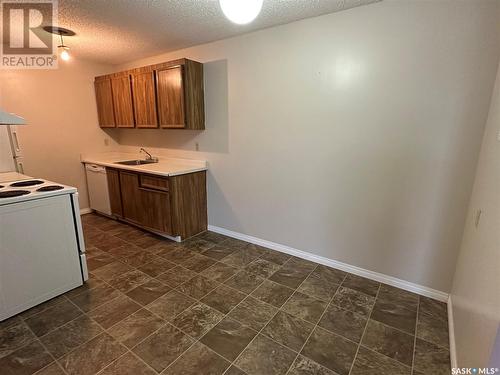 301 1832 Eaglesham Avenue, Weyburn, SK - Indoor Photo Showing Laundry Room