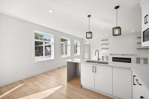 705 Mcclure Road, Kelowna, BC - Indoor Photo Showing Kitchen With Double Sink