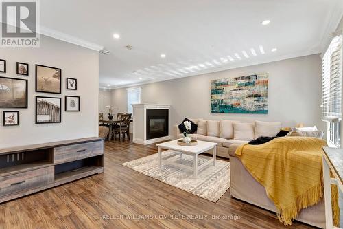 82 East 35Th Street, Hamilton, ON - Indoor Photo Showing Living Room With Fireplace