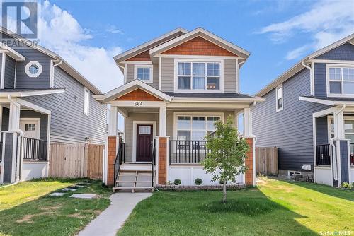 664 Meadows Boulevard, Saskatoon, SK - Outdoor With Deck Patio Veranda With Facade