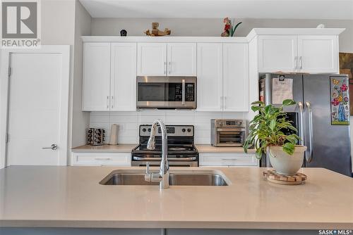 664 Meadows Boulevard, Saskatoon, SK - Indoor Photo Showing Kitchen