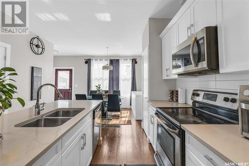 664 Meadows Boulevard, Saskatoon, SK - Indoor Photo Showing Kitchen With Double Sink