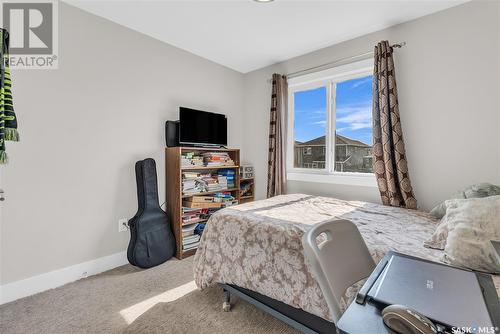 664 Meadows Boulevard, Saskatoon, SK - Indoor Photo Showing Bedroom