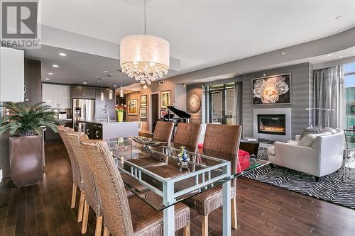 1395 Ellis Street Unit# 605, Kelowna, BC - Indoor Photo Showing Dining Room With Fireplace