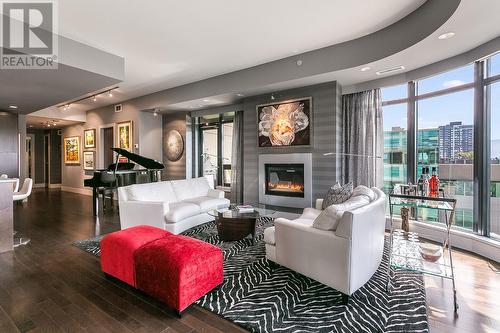 1395 Ellis Street Unit# 605, Kelowna, BC - Indoor Photo Showing Living Room With Fireplace