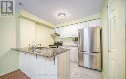 102 - 61 Clarington Boulevard, Clarington (Bowmanville), ON - Indoor Photo Showing Kitchen With Double Sink