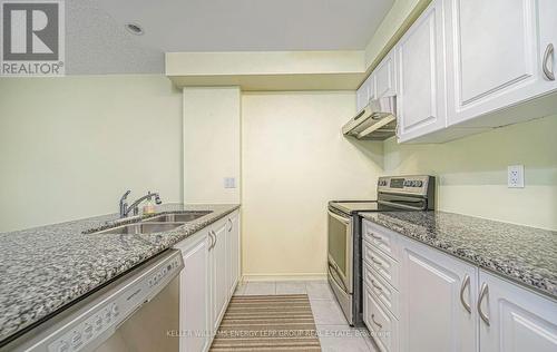 102 - 61 Clarington Boulevard, Clarington (Bowmanville), ON - Indoor Photo Showing Kitchen With Double Sink With Upgraded Kitchen