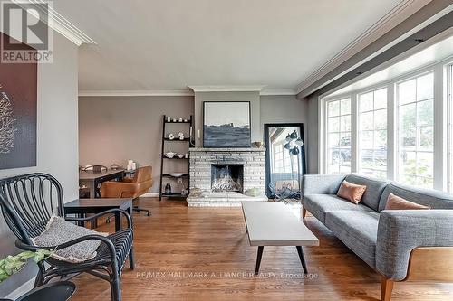 548 Swann Drive, Oakville, ON - Indoor Photo Showing Living Room With Fireplace