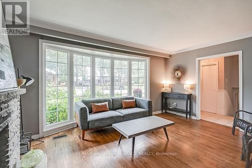 548 Swann Drive, Oakville, ON - Indoor Photo Showing Living Room With Fireplace