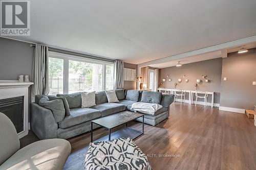 548 Swann Drive, Oakville, ON - Indoor Photo Showing Living Room With Fireplace