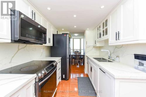 1010 - 20 Cherrytree Drive, Brampton, ON - Indoor Photo Showing Kitchen With Double Sink