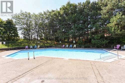 1010 - 20 Cherrytree Drive, Brampton, ON - Outdoor With In Ground Pool With Backyard