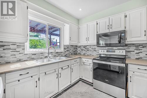 5 Mossbank Drive, Brampton (Fletcher'S Creek South), ON - Indoor Photo Showing Kitchen With Double Sink