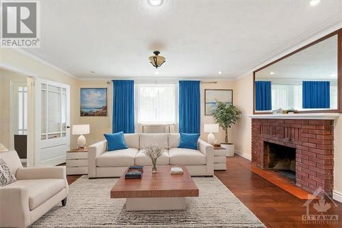 Living Room - virtually staged - 1657 Alta Vista Drive, Ottawa, ON - Indoor Photo Showing Living Room With Fireplace