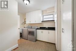 Laundry Room off of Kitchen - main level - 